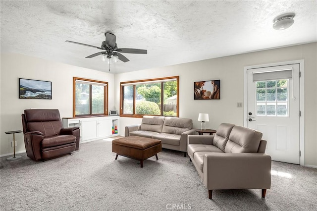 886 Lynn Ln, Chico, CA 95926 - carpeted living area with a textured ceiling and ceiling fan