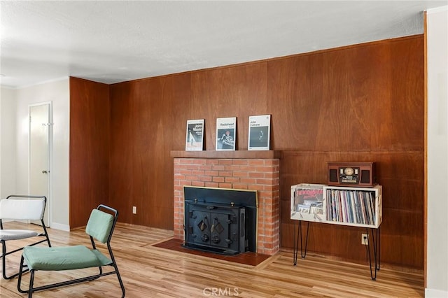 886 Lynn Ln, Chico, CA 95926 - living area featuring wood finished floors, a fireplace, and wood walls