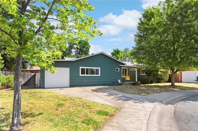 886 Lynn Ln, Chico, CA 95926 - ranch-style home with concrete driveway and a garage