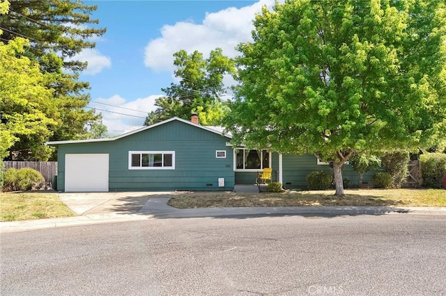 886 Lynn Ln, Chico, CA 95926 - view of front facade featuring driveway and a garage