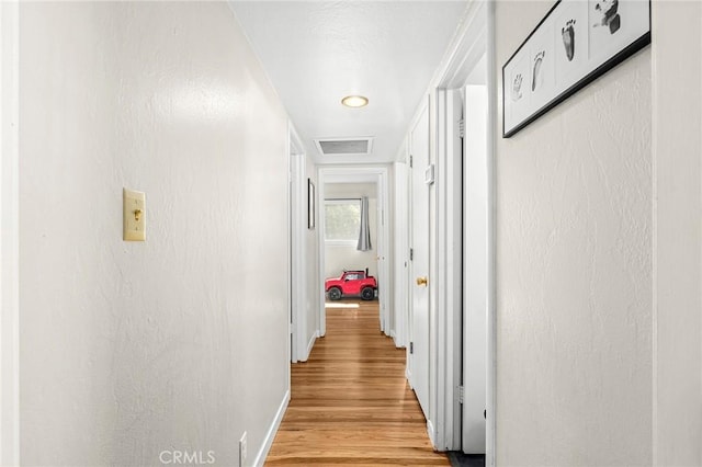 886 Lynn Ln, Chico, CA 95926 - corridor with light wood-type flooring and baseboards