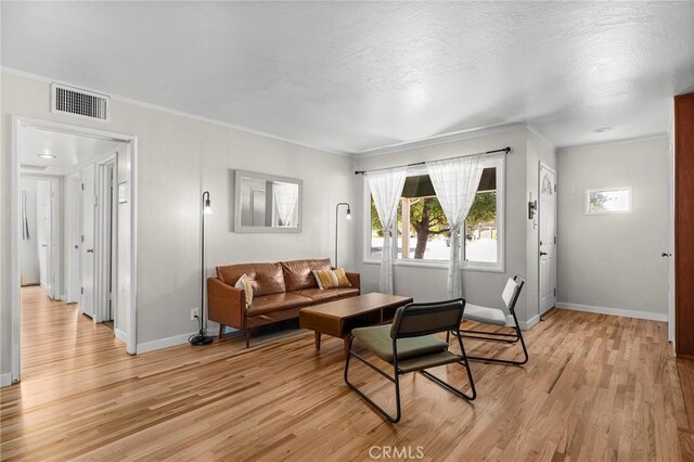 886 Lynn Ln, Chico, CA 95926 - living room featuring light wood-style floors and crown molding