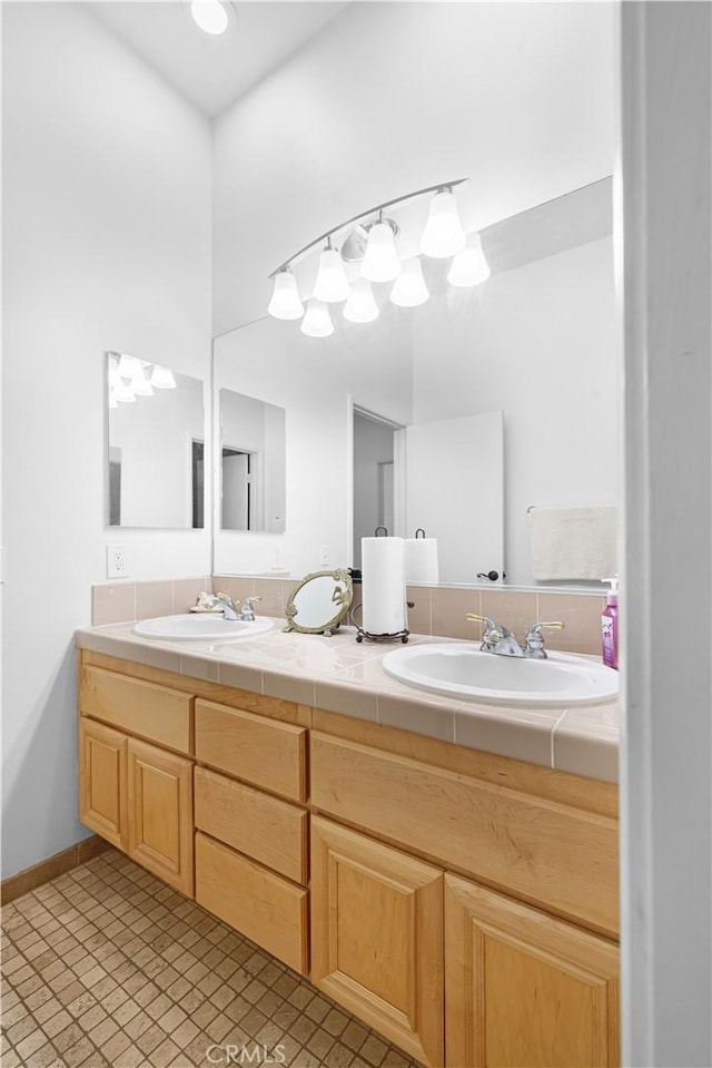44397 Mesquite Dr, Indian Wells, CA 92210 - full bathroom with double vanity and baseboards