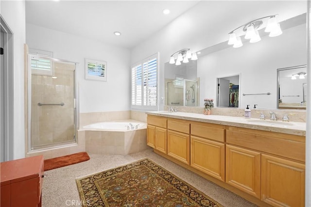 44397 Mesquite Dr, Indian Wells, CA 92210 - bathroom with a shower stall, double vanity, a bath, and recessed lighting