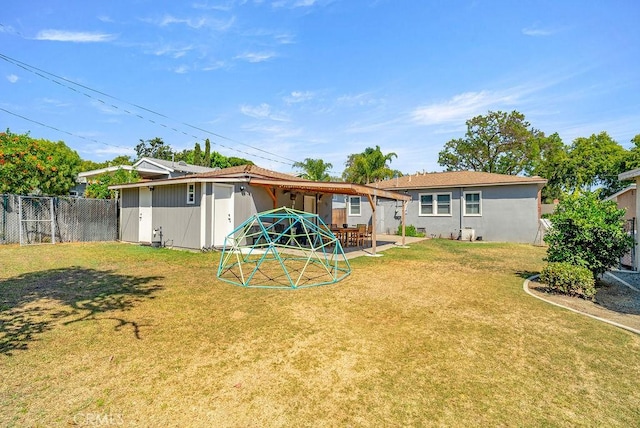 8213 Strub Ave, Whittier, CA 90602 - rear view of house featuring a fenced backyard and a patio