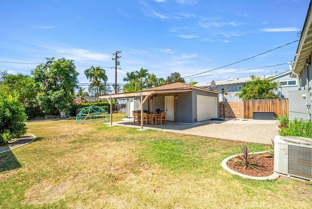 8213 Strub Ave, Whittier, CA 90602 - fenced backyard featuring a patio and a garage