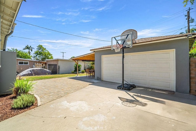 8213 Strub Ave, Whittier, CA 90602 - garage with driveway and a detached garage