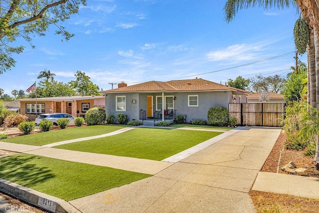 8213 Strub Ave, Whittier, CA 90602 - single story home featuring stucco siding, a porch, and a chimney