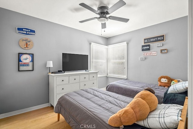 8213 Strub Ave, Whittier, CA 90602 - bedroom with light wood-style flooring and a ceiling fan