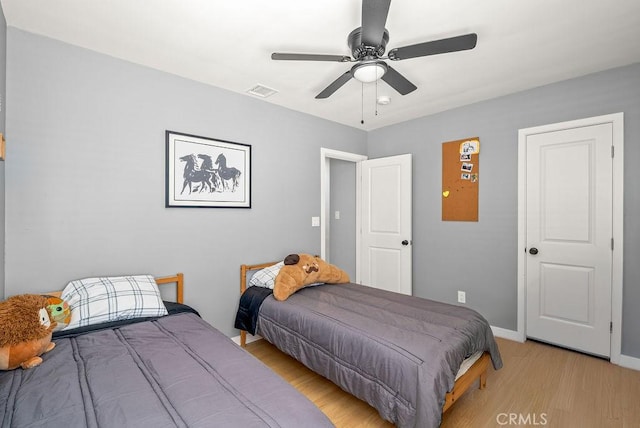 8213 Strub Ave, Whittier, CA 90602 - bedroom with wood finished floors and a ceiling fan