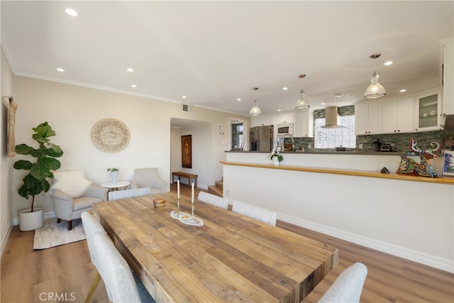 3666 Greve Dr, Rancho Palos Verdes, CA 90275 - dining space with recessed lighting, light wood-type flooring, and crown molding
