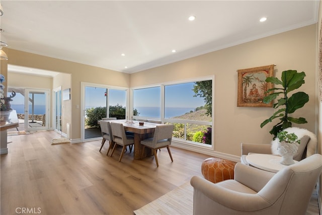 3666 Greve Dr, Rancho Palos Verdes, CA 90275 - dining room featuring light wood-style flooring, recessed lighting, crown molding, and a water view