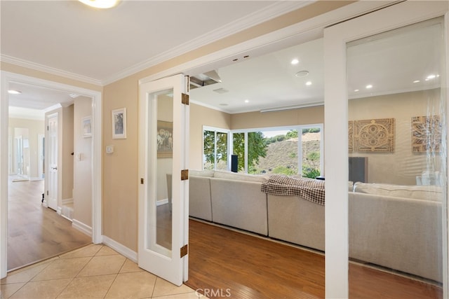 3666 Greve Dr, Rancho Palos Verdes, CA 90275 - hallway with light tile patterned flooring, ornamental molding, and recessed lighting