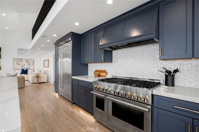 952 Via Del Monte, Palos Verdes Estates, CA 90274 - kitchen with high end appliances, premium range hood, light wood-style floors, blue cabinets, and recessed lighting