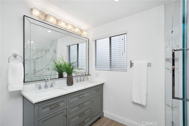 952 Via Del Monte, Palos Verdes Estates, CA 90274 - full bathroom with double vanity, a marble finish shower, and wood finished floors