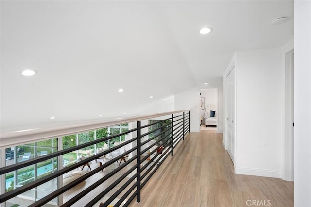 952 Via Del Monte, Palos Verdes Estates, CA 90274 - hallway featuring light wood finished floors, an upstairs landing, and recessed lighting