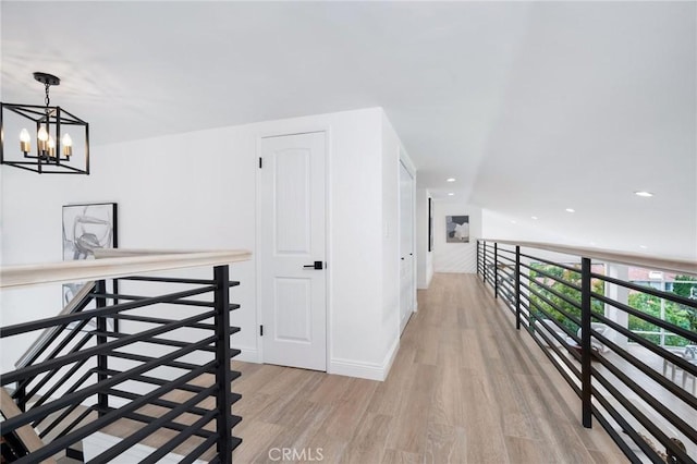 952 Via Del Monte, Palos Verdes Estates, CA 90274 - hall featuring an upstairs landing, light wood-type flooring, a chandelier, and recessed lighting
