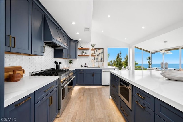 952 Via Del Monte, Palos Verdes Estates, CA 90274 - kitchen featuring range with two ovens, vaulted ceiling, light wood-style floors, backsplash, and open shelves