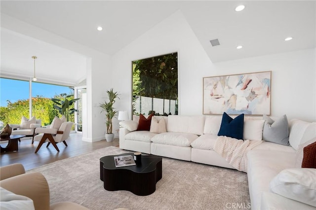 952 Via Del Monte, Palos Verdes Estates, CA 90274 - living room with wood finished floors, vaulted ceiling, recessed lighting, and a wall of windows