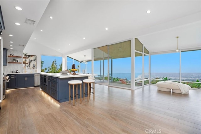 952 Via Del Monte, Palos Verdes Estates, CA 90274 - kitchen with open shelves, light countertops, healthy amount of natural light, floor to ceiling windows, and lofted ceiling