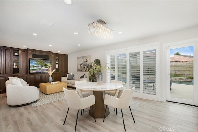 9552 Castine Dr, Huntington Beach, CA 92646 - dining area with light wood-style flooring and recessed lighting