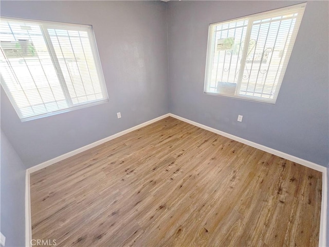 15951 M St, Mojave, CA 93501 - unfurnished room featuring wood finished floors and baseboards