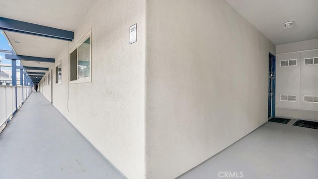 1202 N Pacific St Unit 203A, Oceanside, CA 92054 - entrance to property with stucco siding and a balcony