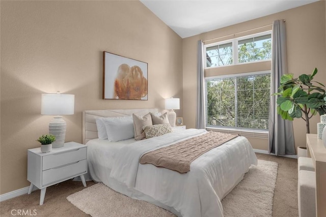 18051 Joyful Ln Unit 201, Huntington Beach, CA 92648 - bedroom featuring carpet floors and vaulted ceiling