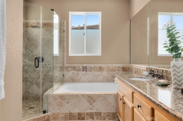 18051 Joyful Ln Unit 201, Huntington Beach, CA 92648 - bathroom featuring vanity, a stall shower, and a bath
