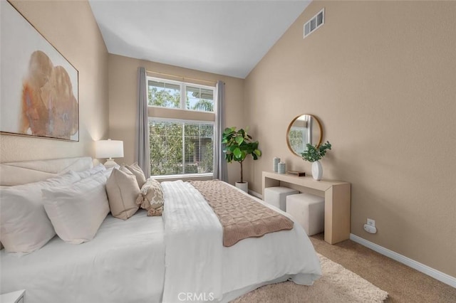 18051 Joyful Ln Unit 201, Huntington Beach, CA 92648 - carpeted bedroom with lofted ceiling and baseboards