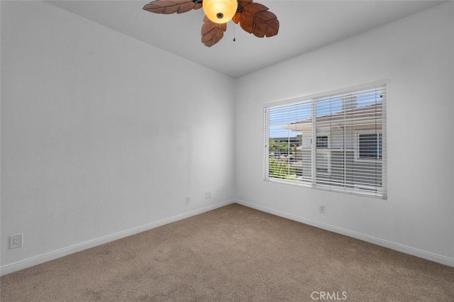 18051 Joyful Ln Unit 201, Huntington Beach, CA 92648 - carpeted spare room with baseboards and ceiling fan