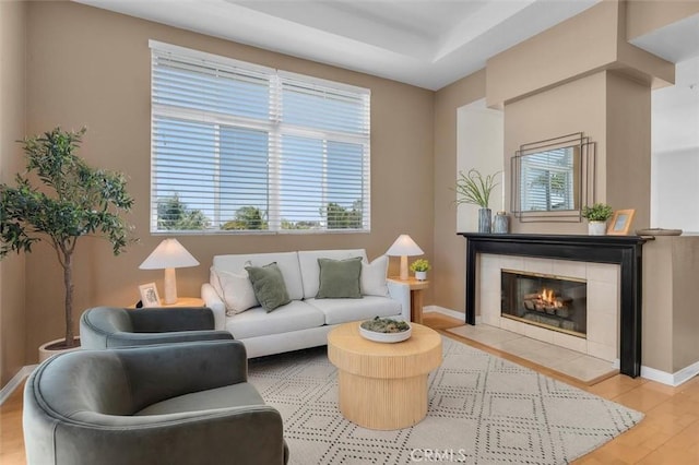 18051 Joyful Ln Unit 201, Huntington Beach, CA 92648 - living room with wood finished floors and a fireplace
