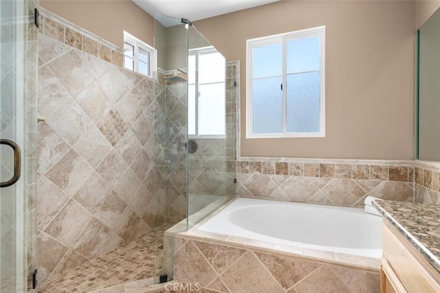 18051 Joyful Ln Unit 201, Huntington Beach, CA 92648 - bathroom featuring a stall shower, vanity, and a bath