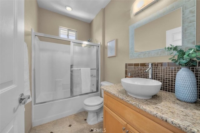 18051 Joyful Ln Unit 201, Huntington Beach, CA 92648 - full bath with vanity, combined bath / shower with glass door, and tile patterned floors