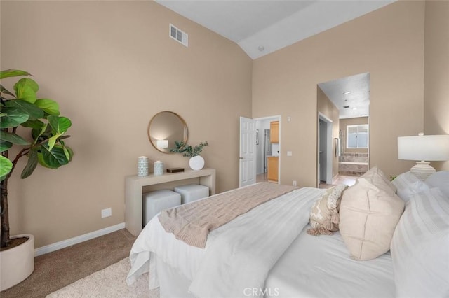 18051 Joyful Ln Unit 201, Huntington Beach, CA 92648 - carpeted bedroom with high vaulted ceiling and ensuite bath