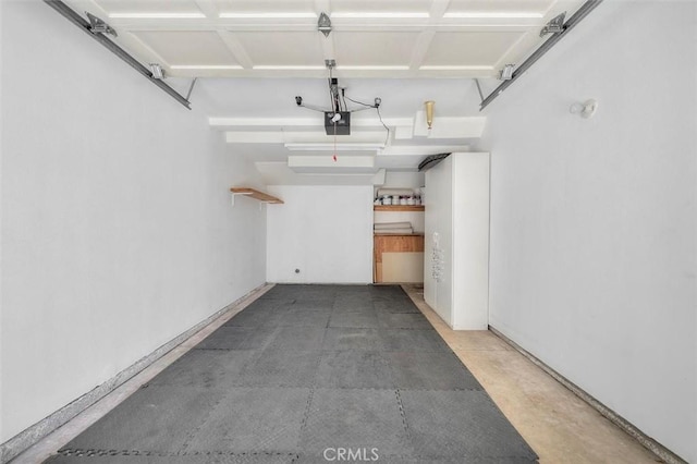 18051 Joyful Ln Unit 201, Huntington Beach, CA 92648 - garage with a garage door opener