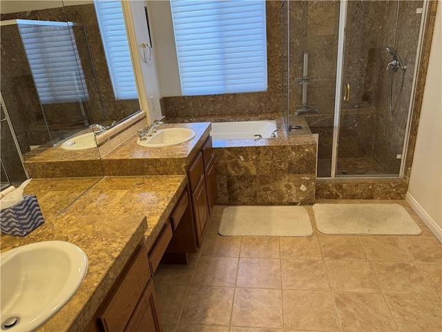 22045 Milestone St, Saugus, CA 91390 - full bathroom featuring double vanity, a garden tub, a stall shower, and tile patterned floors