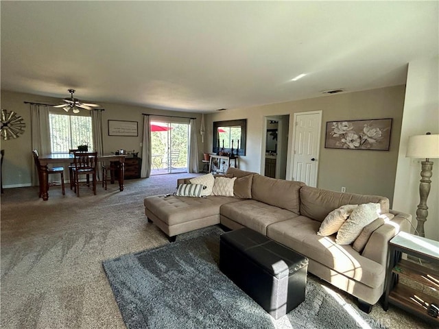 42445 Deep Forest Dr, Coarsegold, CA 93614 - carpeted living room featuring healthy amount of natural light and a ceiling fan