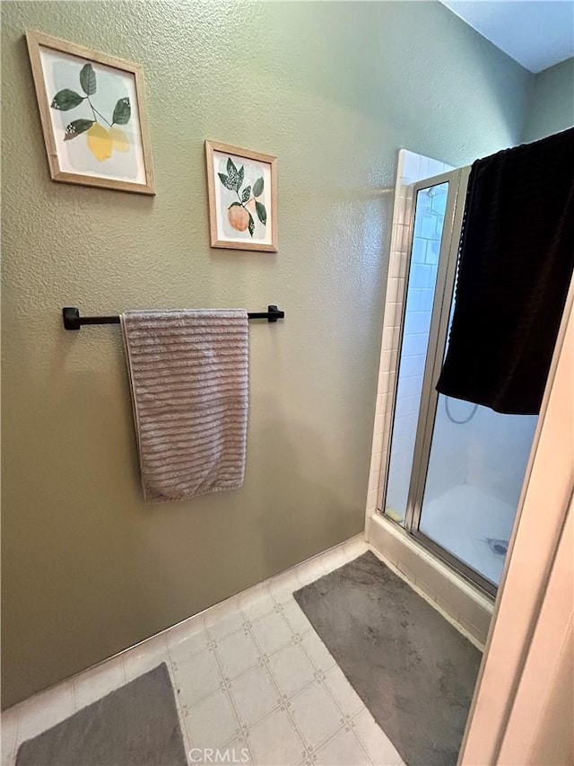 42445 Deep Forest Dr, Coarsegold, CA 93614 - bathroom featuring a stall shower and tile patterned floors
