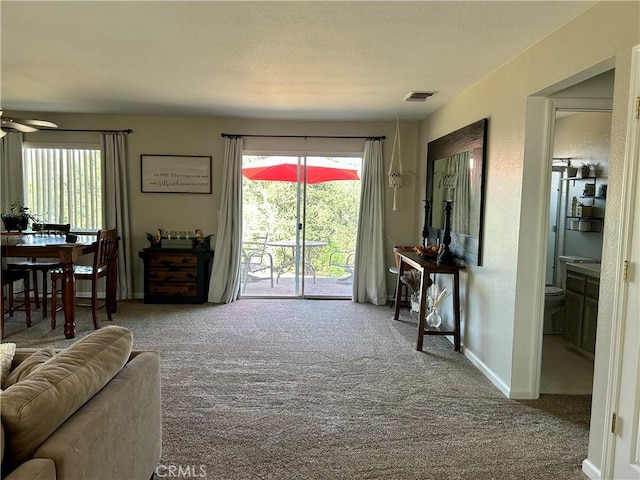 42445 Deep Forest Dr, Coarsegold, CA 93614 - carpeted living area featuring baseboards and ceiling fan