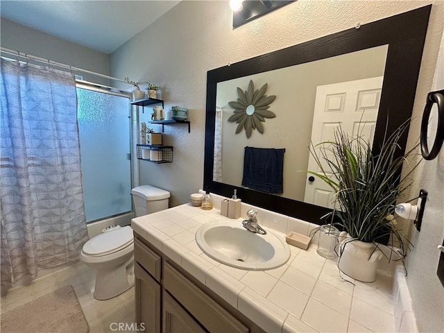 42445 Deep Forest Dr, Coarsegold, CA 93614 - bathroom with vanity, a textured wall, shower / bath combo, and tile patterned floors
