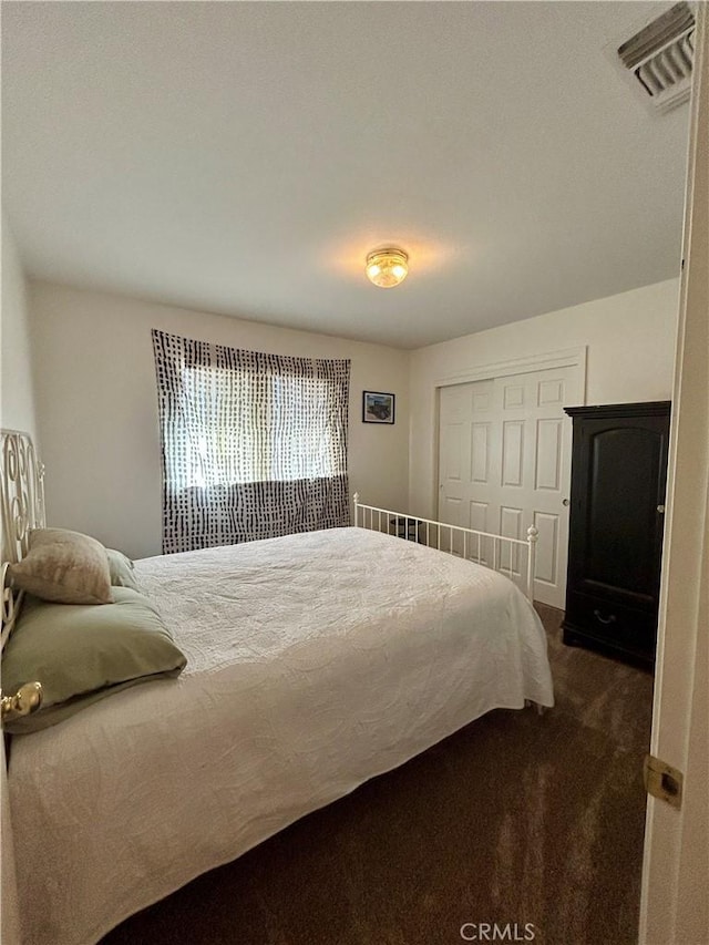 42445 Deep Forest Dr, Coarsegold, CA 93614 - bedroom with a closet and dark carpet