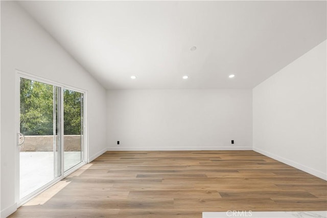 18718 Delight St, Canyon Country, CA 91351 - unfurnished room featuring vaulted ceiling, recessed lighting, and light wood finished floors