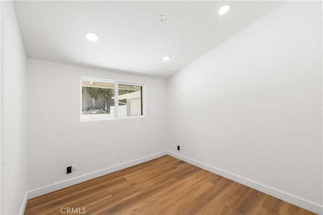 18718 Delight St, Canyon Country, CA 91351 - spare room with light wood-type flooring and recessed lighting