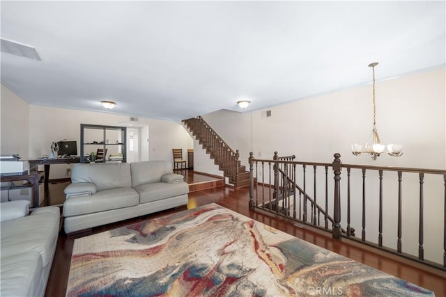 18100 Burbank Blvd Unit 11, Tarzana, CA 91356 - living area with a chandelier, wood finished floors, and an office area