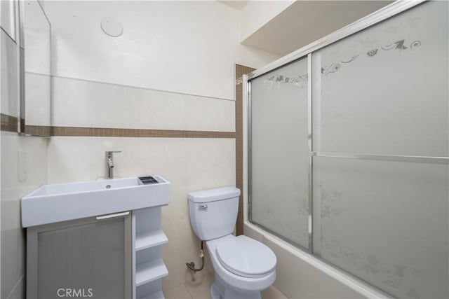 18100 Burbank Blvd Unit 11, Tarzana, CA 91356 - bathroom with toilet and shower / bath combination with glass door