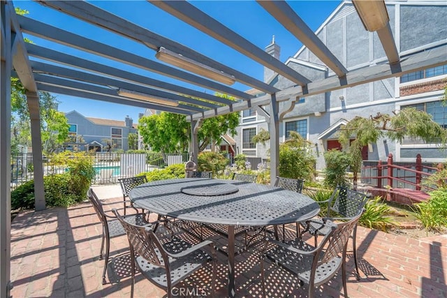 18100 Burbank Blvd Unit 11, Tarzana, CA 91356 - view of patio with a pergola and outdoor dining space