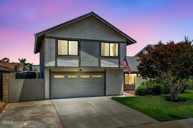 3051 Ketch Pl, Oxnard, CA 93035 - view of front of property with stucco siding, concrete driveway, and a garage