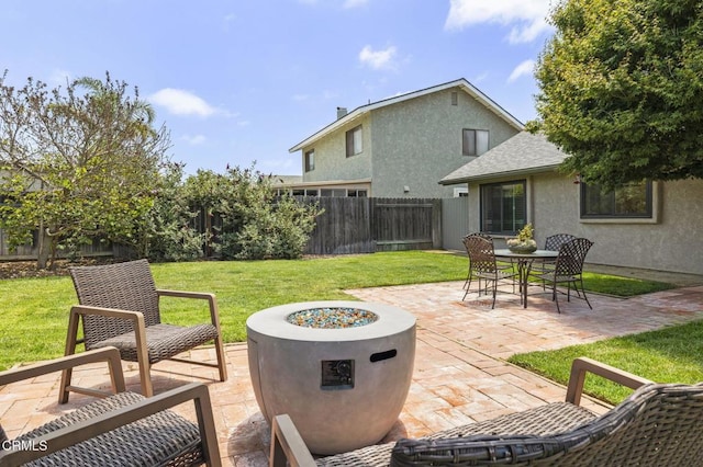 3051 Ketch Pl, Oxnard, CA 93035 - fenced backyard featuring a patio and an outdoor fire pit