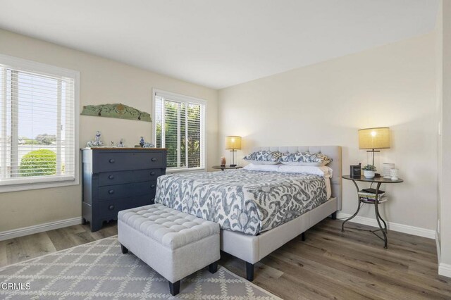 3051 Ketch Pl, Oxnard, CA 93035 - bedroom featuring baseboards and wood finished floors